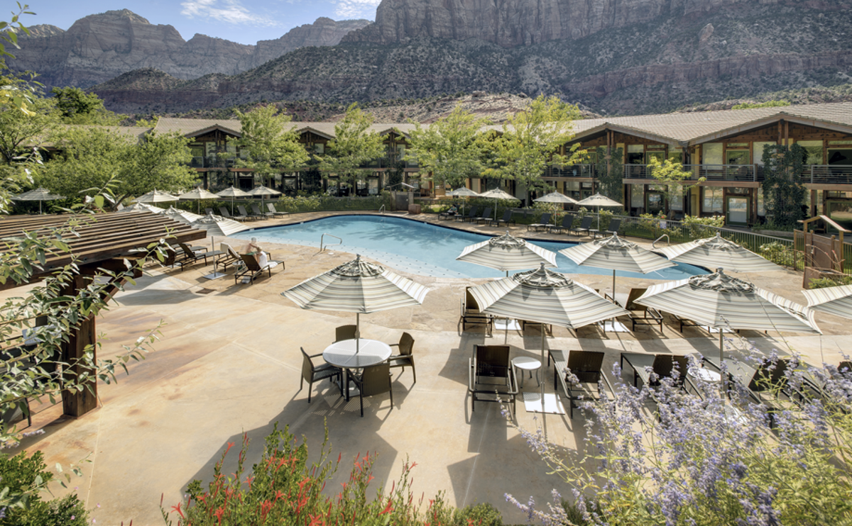 <p><strong>Distance From Zion National Park:</strong> 2 miles</p><p>A property that's equally suited for families or couples is <a href="https://www.desertpearl.com/en/homepage">Desert Pearl Inn</a>, located next to the Virgin River and a short drive from the park. It also wins points for design, thanks to its native stone walkways, private balconies, and construction made partially from reclaimed 100-year-old railroad trestles. Other amenities include a park shuttle stop, local favorite restaurant <a href="https://www.desertpearl.com/en/dine/camp-zion">Camp Outpost Co.</a>, and beautiful views of West Temple: the highest peak in Zion Canyon. </p><p><a class="body-btn-link" href="https://go.redirectingat.com?id=74968X1553576&url=https%3A%2F%2Fwww.tripadvisor.com%2FHotel_Review-g61001-d99964-Reviews-Desert_Pearl_Inn-Springdale_Utah.html&sref=https%3A%2F%2Fwww.popularmechanics.com%2Fadventure%2Foutdoors%2Fg60538303%2Fbest-hotels-near-zion-national-park%2F">Shop Now</a></p>