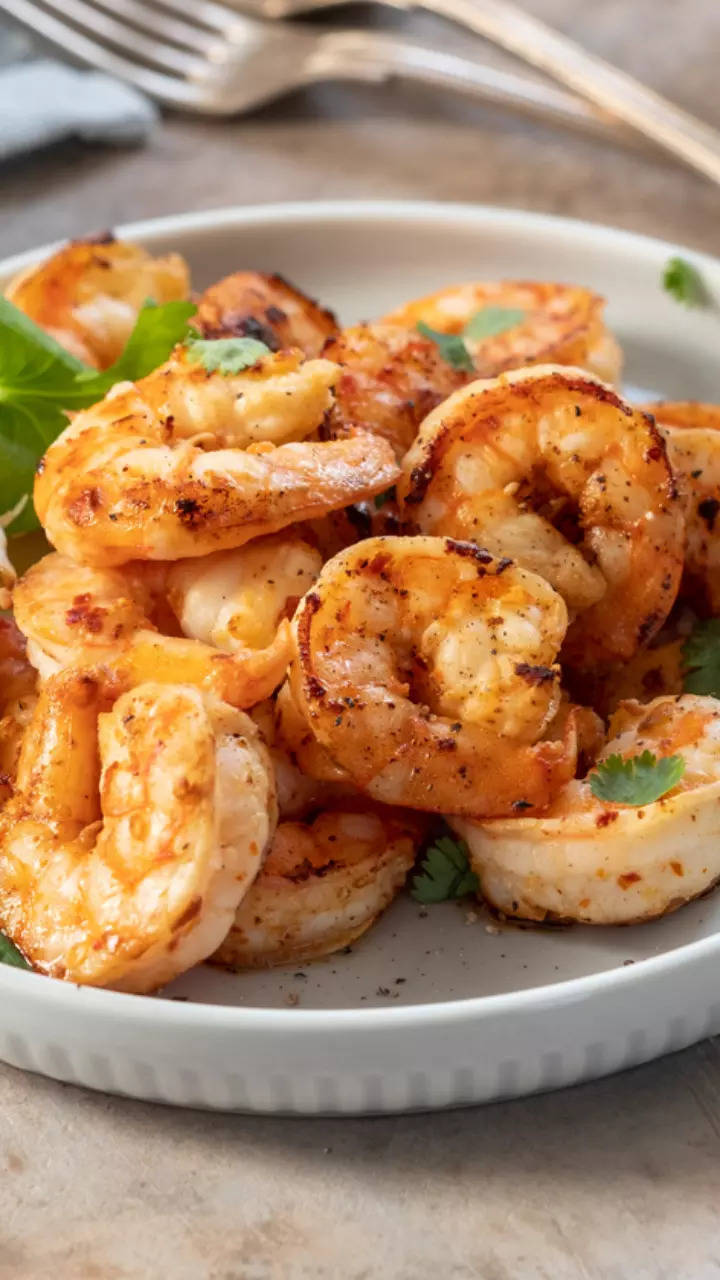<p>This popular side dish is made with juicy prawns cooked with a mix of spices, onions, and tomatoes, resulting in a rich and spicy dish.</p>