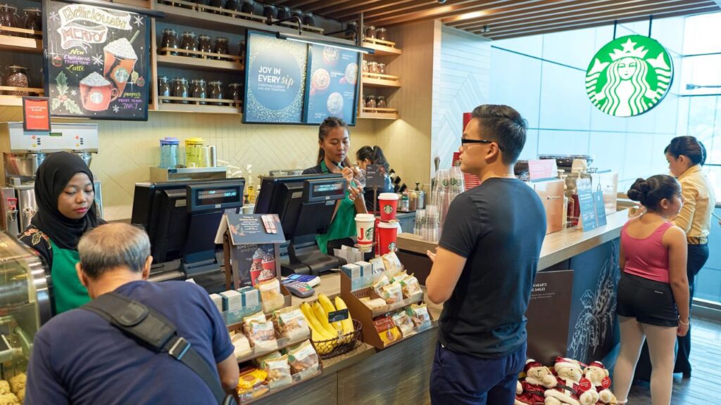 <p>Many people are not going to premium coffee shops as much anymore – these places can charge a lot for a cup of coffee. Instead, folks are making their coffee at home or finding cheaper options.</p><p>Making coffee at home saves money and can still taste great. This change lets people enjoy their daily coffee without spending too much, keeping more money in their pockets.</p>
