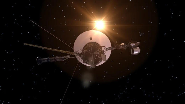Voyager 1 is seen with the sun in the background in this screencap from a 3D visualization of the craft.