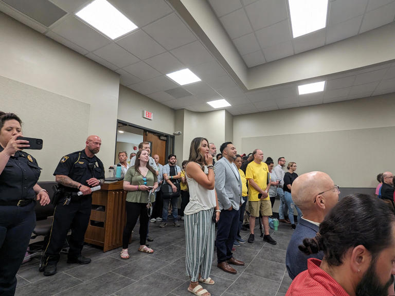 The Topeka City Council meeting on May 21 drew a large crowd of people waiting for the new homeless reduction plan to be presented.