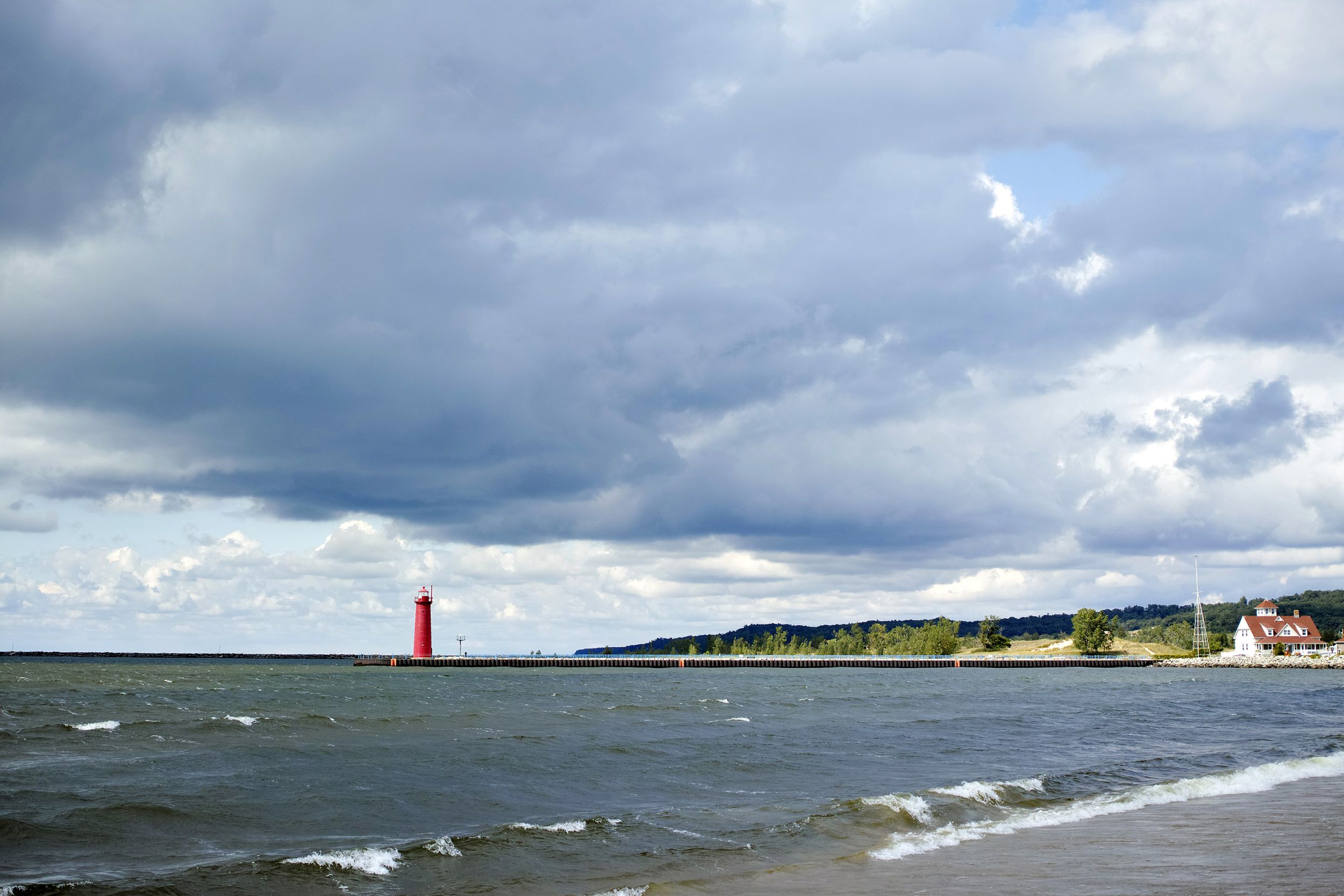 <p>Michigan may not be the first place that comes to mind when thinking "beach vacation," but Muskegon's <a href="https://www.michigan.org/property/pere-marquette-park/">Pere Marquette Beach</a> on Lake Michigan is free — and the largest in western Michigan. It includes a playground, volleyball courts, a restaurant and access to lighthouses and the Muskegon Channel. It's also home to the <a href="https://silversidesmuseum.org">USS Silversides</a>, a World War II submarine and museum ($17.55 for adults, $13 for kids 5 to 17). Downtown Muskegon offers a variety of affordable restaurants, three <a href="https://www.cheapism.com/blog/10-brewery-tours-feature-free-craft-beer-4186/">breweries</a>, and a regular farmers market. Hotel prices? For this beach trip, you can <a href="https://www.dpbolvw.net/click-3559491-12848577?sid=msnshop15286-vr&url=https%3A%2F%2Fwww.orbitz.com%2FPere-Marquette-Park-Beach-Hotels.0-l6170098-0.Travel-Guide-Filter-Hotels">book hotel rooms</a> for less than $70 a night.</p>