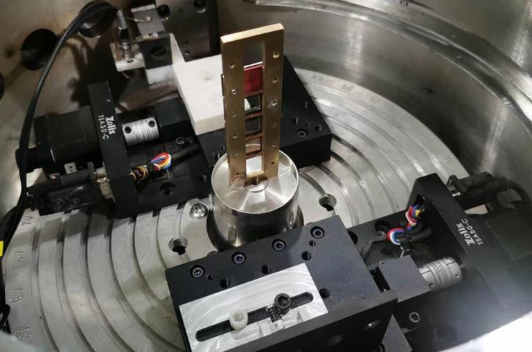 The target chamber was equipped with a collimator, a target holder, and a Faraday cup. Si3N4 foil degraders were installed on the target holder. The Q3D magnetic spectrograph is able to rotate around the target chamber. Credit: China Institute of Atomic Energy