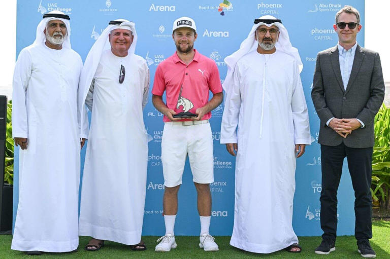 Winner of the 2024 UAE Challenge, and current leader of the Road to Mallorca Rankings, Rasmus Neergaard-Petersen with tournament officials at Saadiyat Beach Golf Club. - Supplied photo