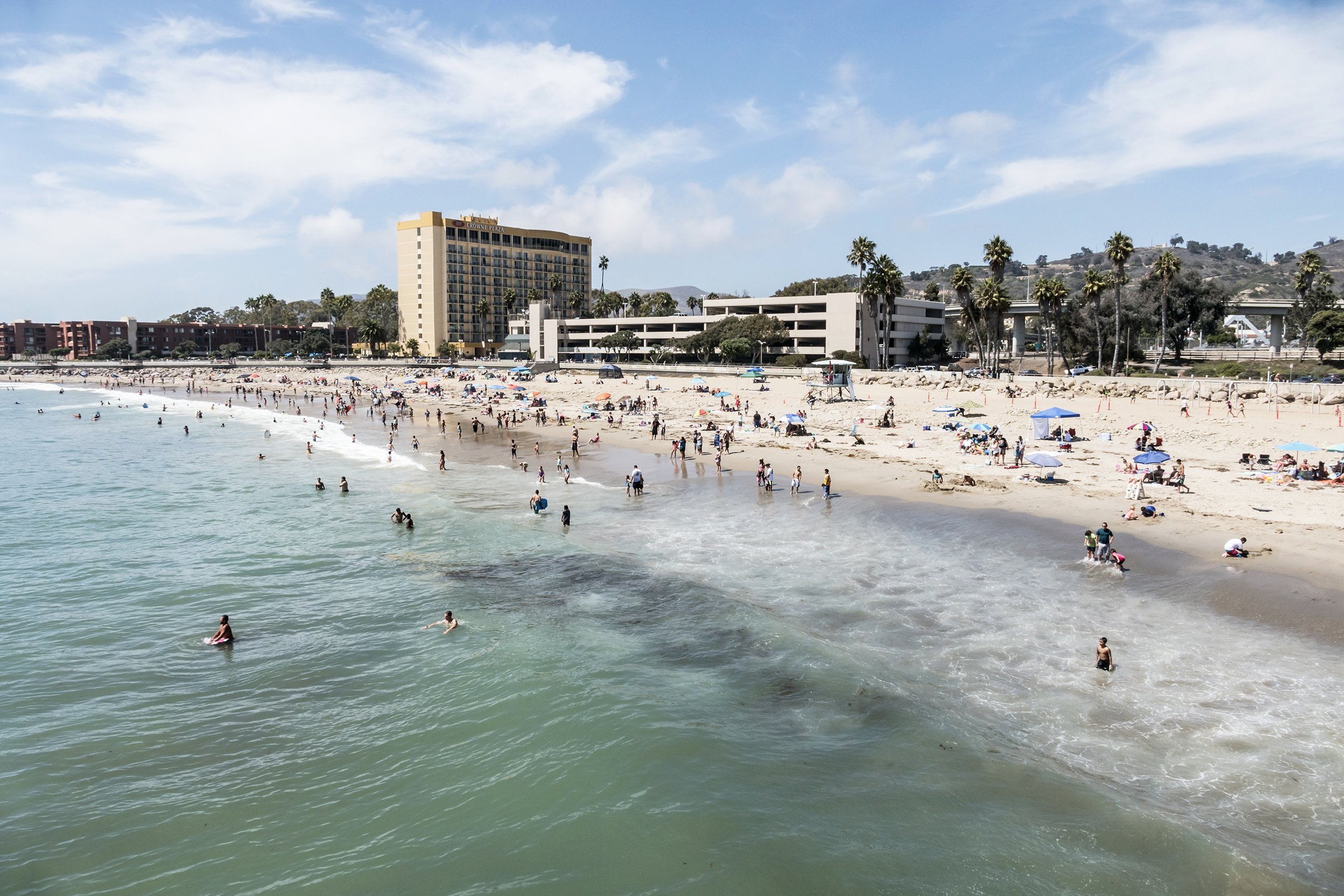 <p>Skip Santa Barbara to the north and Malibu to the south and head for the much more affordable beaches of Ventura County. <a href="https://www.tkqlhce.com/click-3559491-14430556?sid=msnshop15286-vr&url=https%3A%2F%2Fwww.hotels.com%2Fsearch.do%3Fdestination-id%3D11049605%26q-rooms%3D1%26q-room-0-adults%3D2%26q-room-0-children%3D0%26sort-order%3DBEST_SELLER">Accommodations are cheaper</a> in the area's less glamorous beach towns, where vacationers enjoy free street parking, daytime lifeguards, piers, volleyball courts, and beaches that rival the beauty of the more upscale spots nearby. Top beach options include Port Hueneme Beach Park (where there’s picnic tables, barbecue pits, volleyball courts, and a 24-hour fishing pier,) as well as Surfer’s Point Beach, Emma Wood State Beach, and Silver Strand Beach, known for its surfing, fishing, and family-friendly atmosphere.</p>