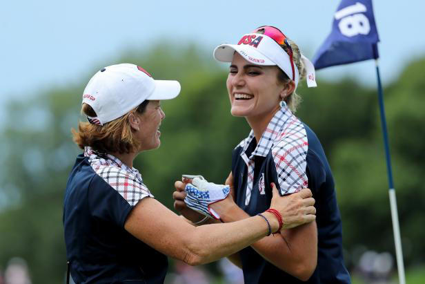 Juli Inkster and Lexi Thompson share a laugh during the 2017 Solheim Cup.