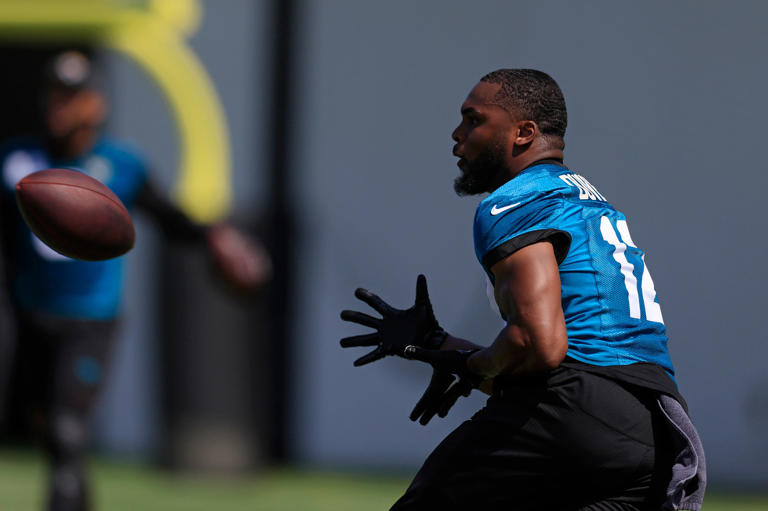 Jacksonville Jaguars wide receiver/returner Devin Duvernay looks back for a pass during an organized team activity on May 28 at the Miller Electric Center. Jaguars special-teams coordinator Heath Farwell said Duvernay has "elite speed."