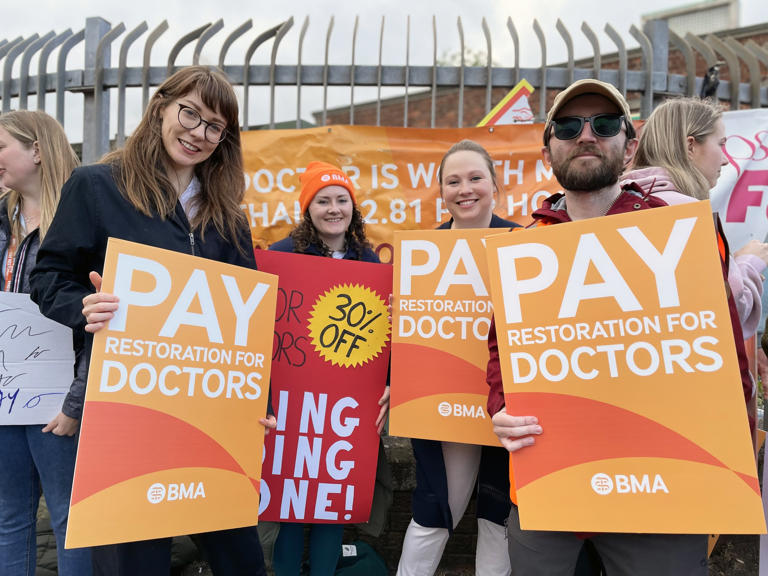 Junior doctors on the picket line outside the Royal Victoria Hospital in west Belfast during a 48-hour strike in Northern Ireland over pay and staff retention on 22 May (Photo: PA)