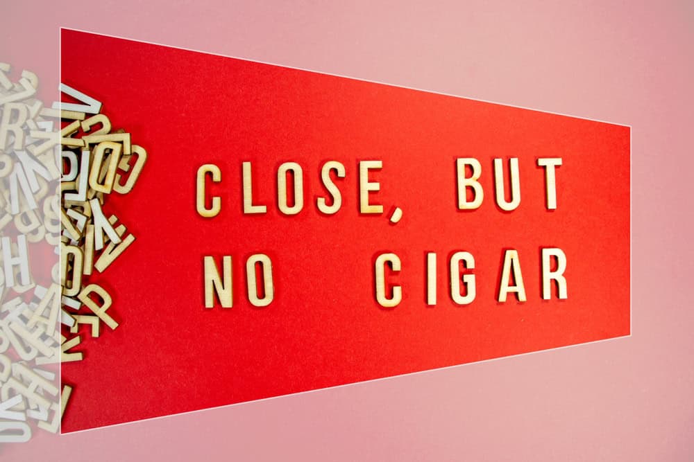 <p><span>This saying, used to denote a near miss, comes from early carnival games. Winners were often awarded cigars. If someone came close to winning but didn’t succeed, they would hear, “Close, but no cigar.”</span></p>