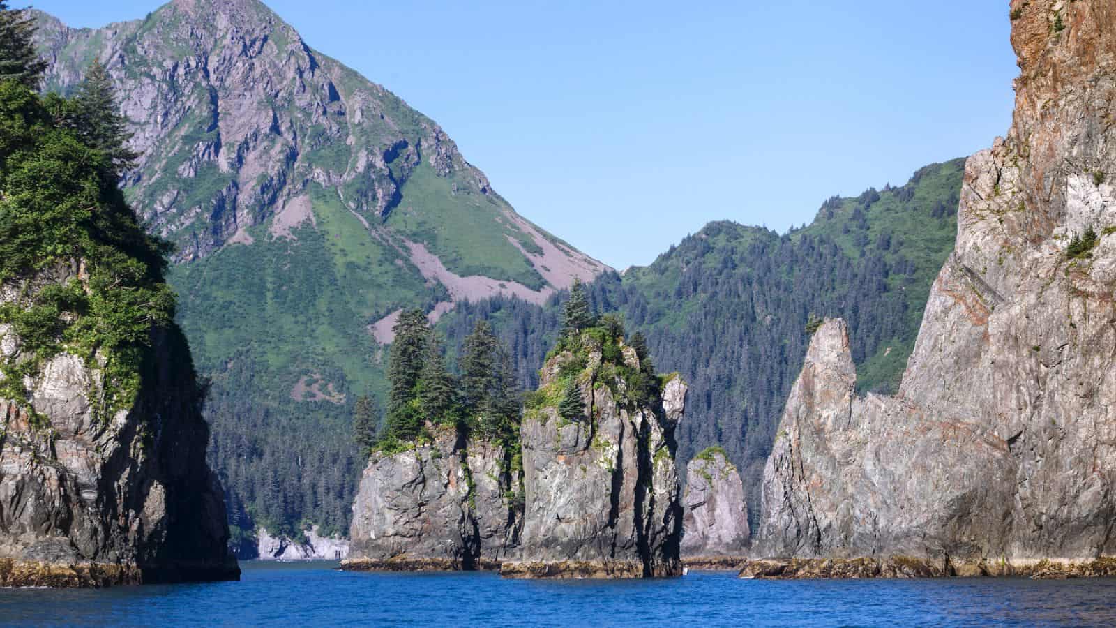 <p>If you’re looking for a kayaking experience that’s both unique and exhilarating, Kenai Fjords National Park in Alaska is a must-visit destination. With its dramatic mountains and crystal-clear waters, this park offers a once-in-a-lifetime experience for kayakers of all skill levels.</p> <p>As you paddle through the park’s icy waters, you’ll have the opportunity to see a wide variety of marine life, including whales, otters, and sea lions. You might even catch a glimpse of a puffin or two!</p> <p>For those who enjoy hiking, the park also offers plenty of opportunities for exploring on foot. With miles of trails winding through the mountains and along the coast, there’s always something new to discover. And if you’re feeling adventurous, you can even try your hand at whitewater kayaking in some of the park’s more challenging rapids.</p>