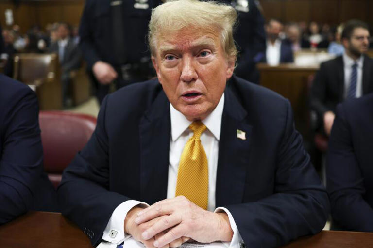 Former President Trump in court on Wednesday. ((Charly Triballeau / Associated Press))