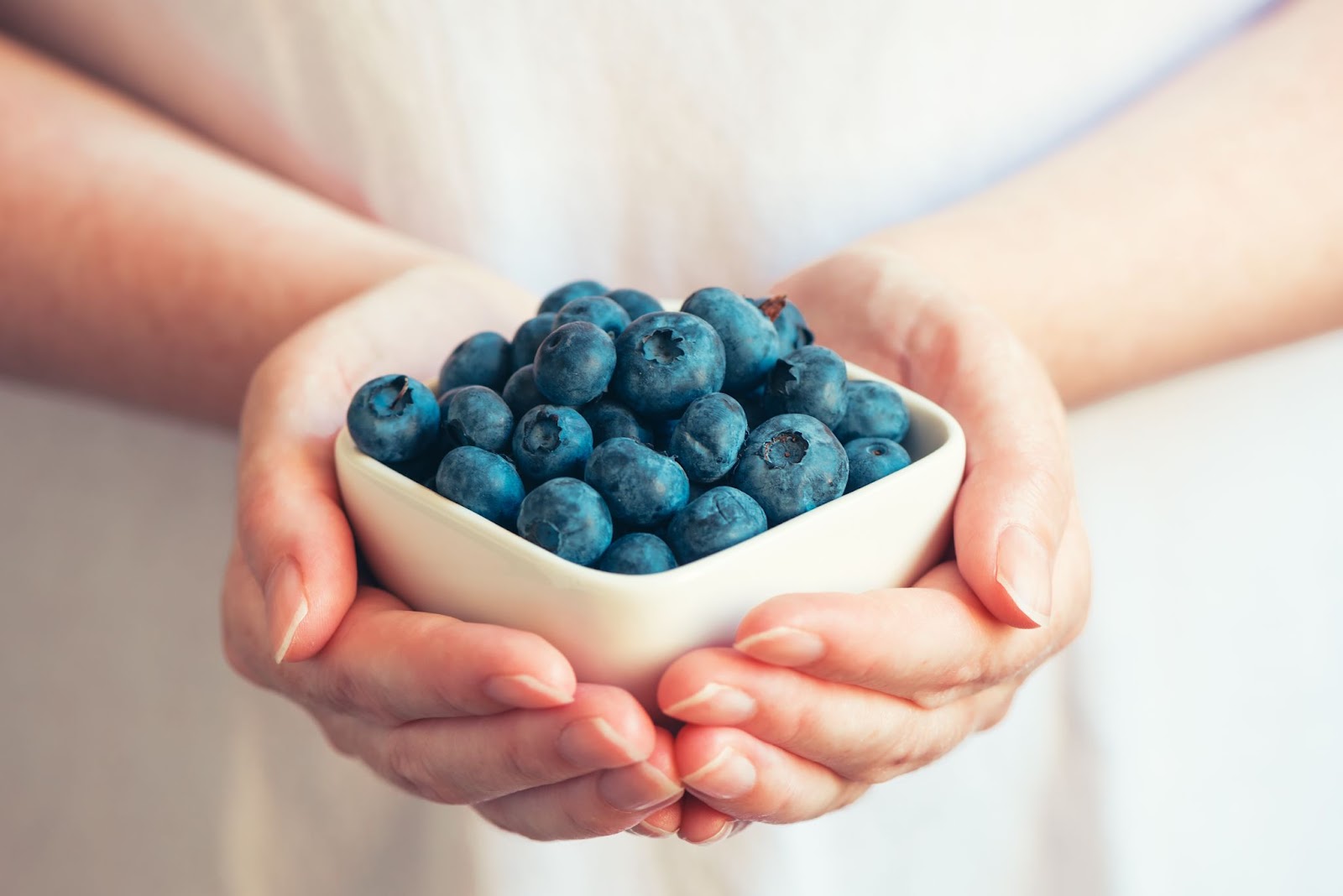 <p>Blueberries, often referred to as nature's wrinkle cream, are rich in antioxidants, particularly anthocyanins, which combat free radicals that accelerate aging and damage cells. Regular consumption of these tiny blue orbs can improve skin radiance, memory, and potentially lower the risk of heart disease and cancer. Enjoy them in smoothies, yogurt, oatmeal, or by the handful for a sweet, anti-aging snack.</p> <p>To enhance the skin-boosting effects, combine blueberries with other nutrient-rich foods. Greek yogurt offers probiotics for gut health and clearer skin, while chia seeds provide hydrating omega-3 fatty acids. Nuts and seeds like almonds and sunflower seeds deliver vitamin E, a potent antioxidant that complements the anthocyanins in blueberries. Honey, a natural humectant, also helps retain moisture for softer, supple skin. Incorporating blueberries into your daily meals, whether in smoothies, cereals, puddings, or baked goods, is a delicious way to nourish your body and promote healthy, glowing skin.</p>