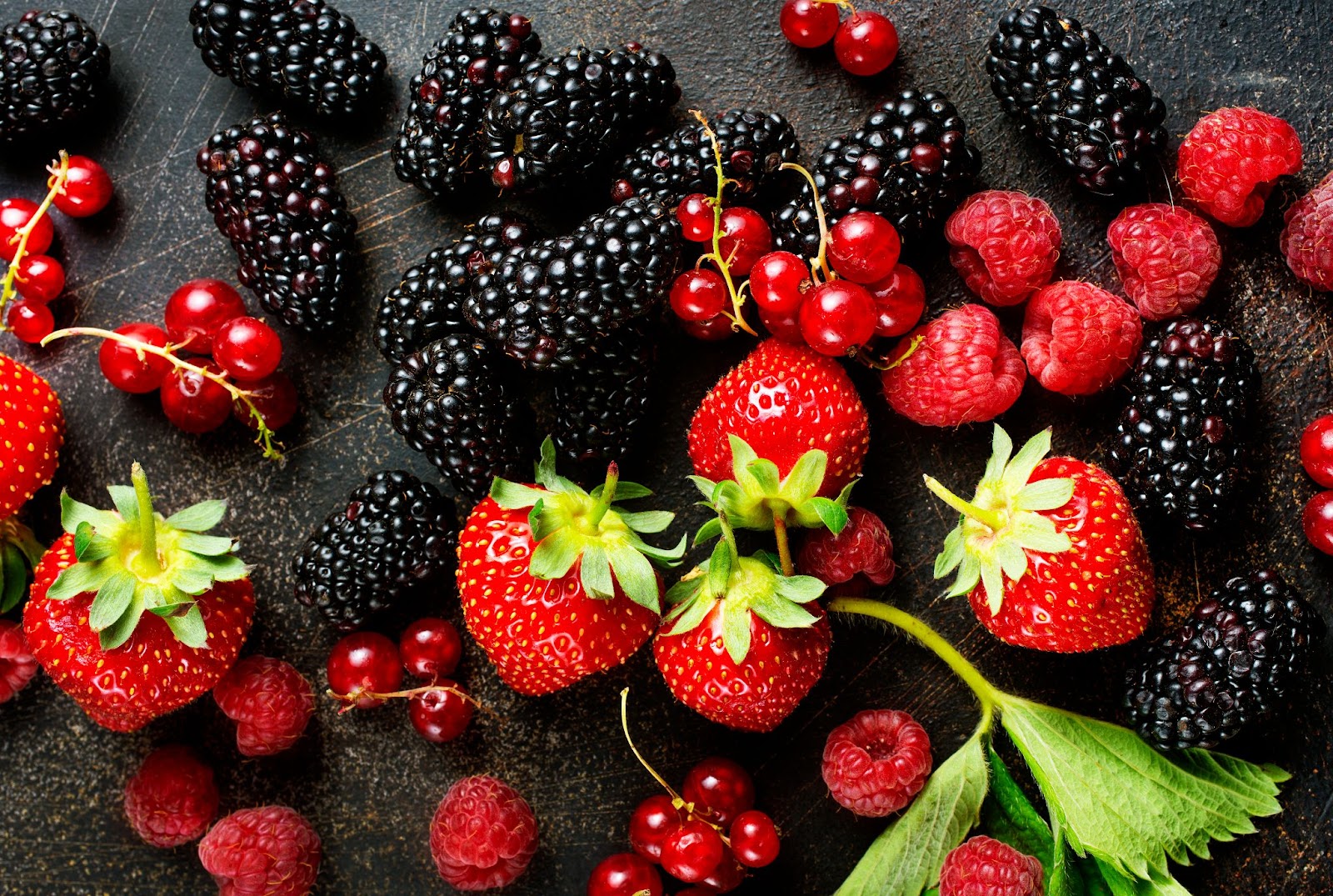 <p>Berries, such as strawberries, raspberries, and blackberries, are not only a delightful and colorful treat, but they are also nutritional powerhouses for anti-aging. Brimming with antioxidants, vitamins, and fiber, these tiny fruits offer a wide range of health benefits.</p> <p>Regular consumption of berries has been linked to a reduced risk of heart disease, improved brain function, and decreased inflammation. Their high antioxidant content helps protect the body against oxidative stress, a key contributor to aging. Enjoy these versatile fruits fresh, blended into smoothies, or as a topping for yogurt and oatmeal for a delicious and nutritious boost to your day.</p>