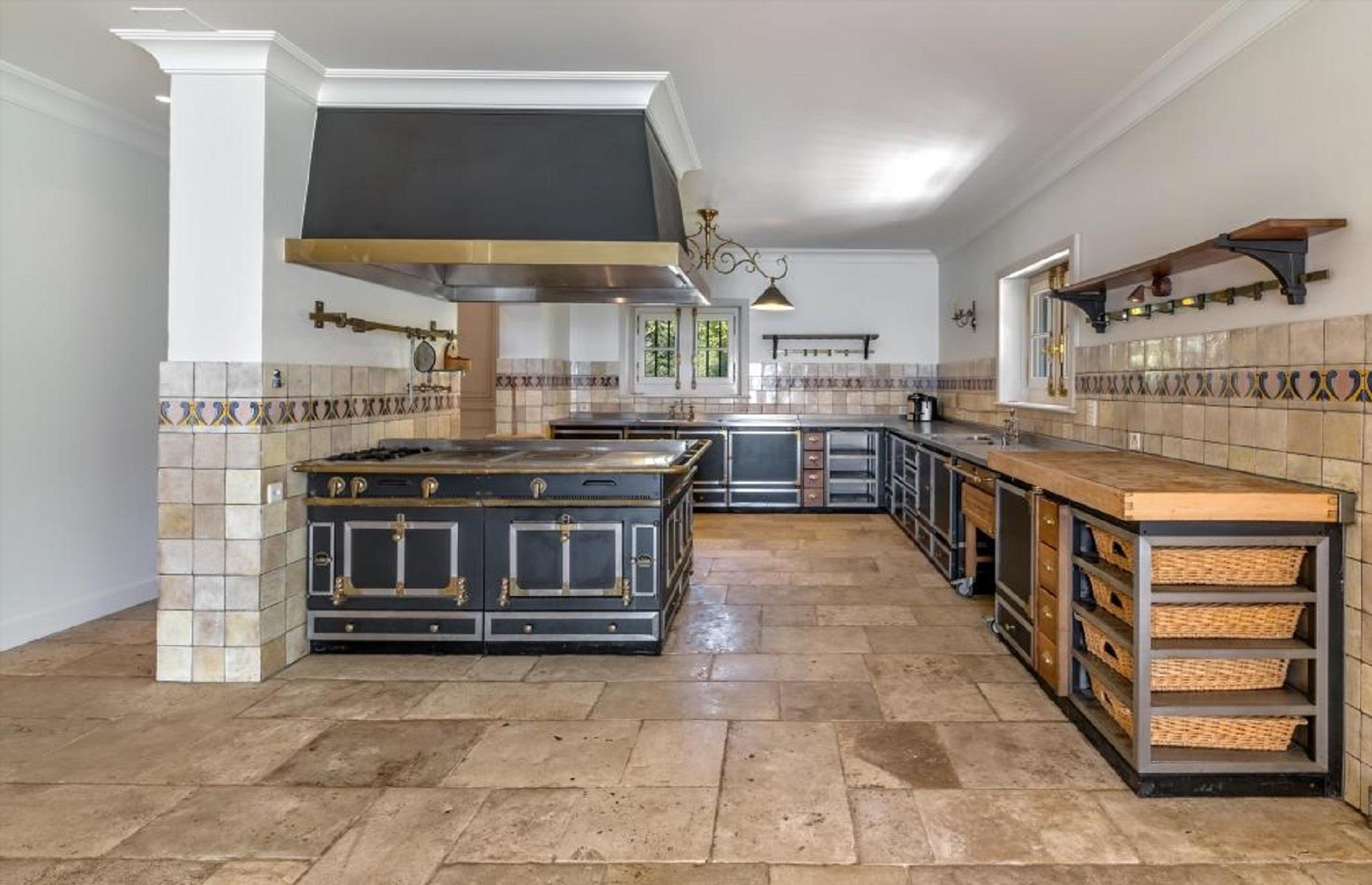<p>Inside, you'll find 7,254 square feet of living space, which encompasses formal lounges and dining spaces, a huge kitchen, seven bedrooms and seven bathrooms.</p>  <p>The 14-room main house isn't the only one on the estate, either. There's a caretaker’s cottage and a three-car garage. But that isn't all, as this home is full of surprises...</p>