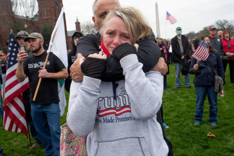 Trump supporter Lisa Morin of Albany, New York cries at a Stop the Steal rally in support of President Trump on December 12, 2020 on the Mall in Washington, D.C. (Photo by Andrew Lichtenstein/Corbis via Getty Images)