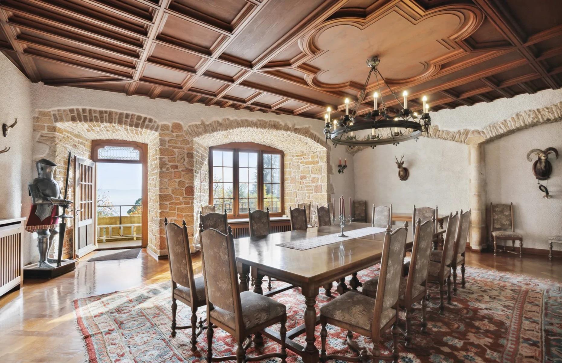 <p>This formal dining room has to be one of the castle's most impressive spaces. With its stunning wooden ceiling, exposed stonework, glossy parquet floor and medieval-inspired details, it's certainly a room that would be fit for a king or queen's banquet. Plus, its windows frame truly unforgettable landscape views.</p>