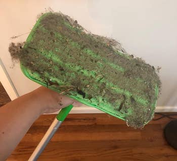 a different reviewer's mop pad covered in dust