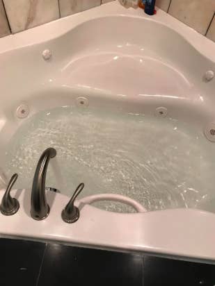 tub running with clear water