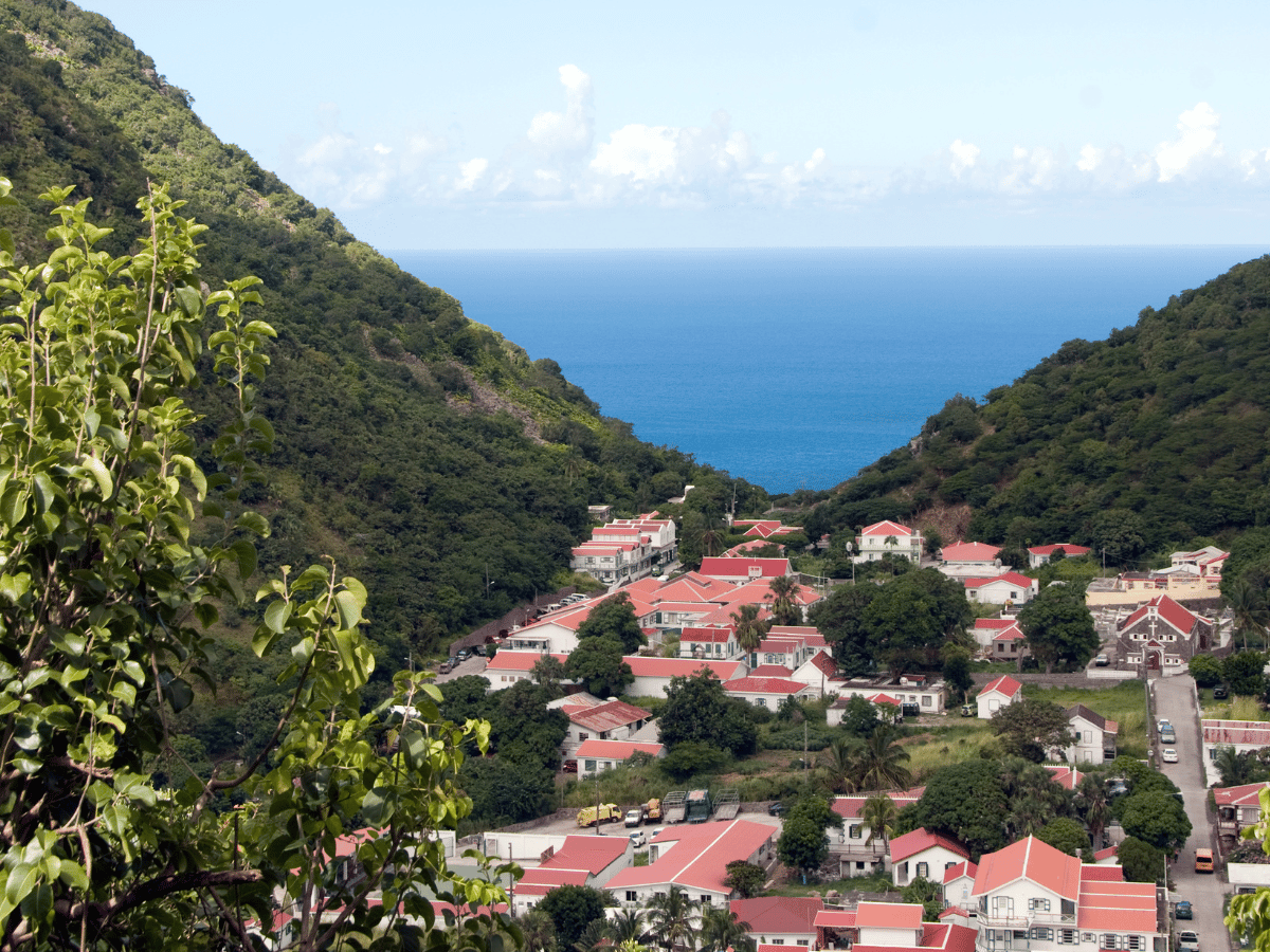 <p>Only five square miles in size, the tiny <a href="https://www.sabatourism.com/">island of Saba</a> is the definition of a hidden gem among the Caribbean islands. With just two thousand permanent residents and four villages, Saba embraces its visitors with a friendly welcome and an unexpectedly rich and diverse travel experience. The island of Saba is the peak of a dormant volcano emerging from the Caribbean Sea, meaning that the island’s topography is truly unique. Explore the island along winding trails and paths before retiring to any of Saba’s boutique hotels or spacious villas, which offer the island’s best viewpoints.</p>