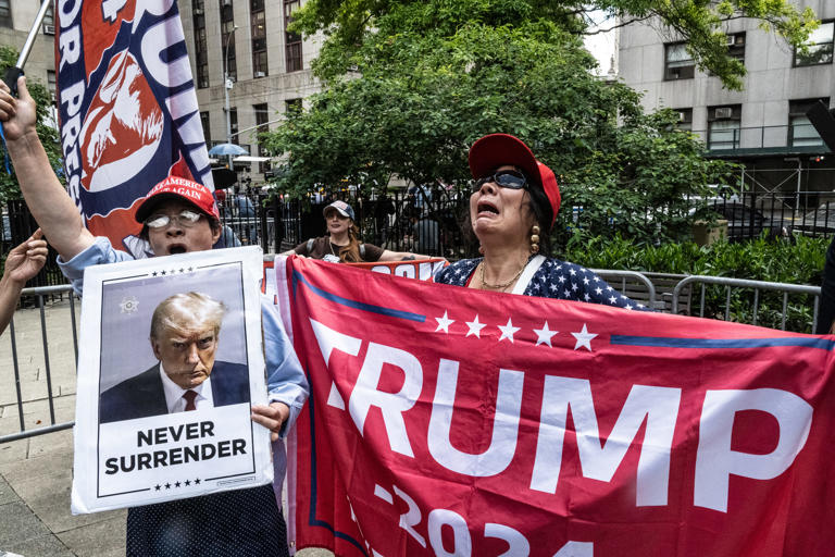 Trump supporters rally outside the criminal court where former President Donald Trump is on trial on May 29, 2024.