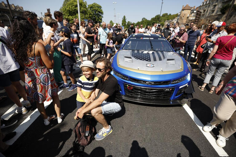 LE MANS, FRANCE - JUNE 03: Fans gather around the NASCAR Next Gen Garage 56 Chevrolet ZL1 ahead of the 100th anniversary of the 24 Hours of Le Mans at the Circuit de la Sarthe June 3, 2023 in Le Mans, France. (Photo by Chris Graythen/Getty Images)