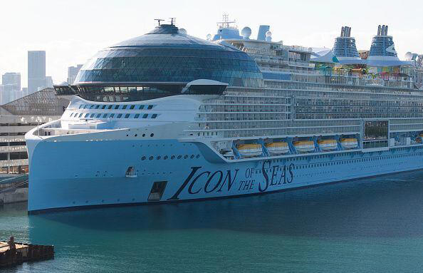 FILE PHOTO: MIAMI, FLORIDA - FEBRUARY 03: In an aerial view, Royal Caribbean's Icon of the Seas, billed as the world's largest cruise ship, is moored at PortMiami after returning from its maiden voyage on February 03, 2024, in Miami, Florida. The 1,197-foot long ship cost $1.79 billion to build, has 20 decks, and can hold a maximum of 7,600 people.