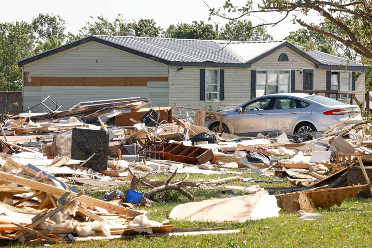 Debris collected by a destroyed house, on Sunday, May 26, 2024, along W Lone Oak Rd. in Valley View, after a tornado moved through the area. Multiple people were killed in Texas and many others injured around the Denton-Cooke County line as an overnight storm system spawned a tornado that chewed through a truck stop and destroyed homes.