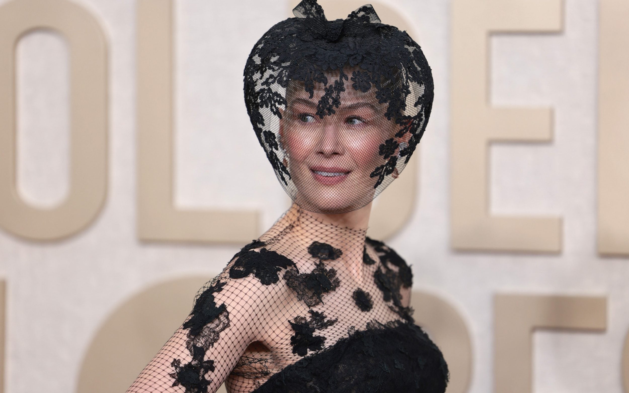 Rosamund Pike leads the Golden Globes style stars in a ‘weird funeral ...