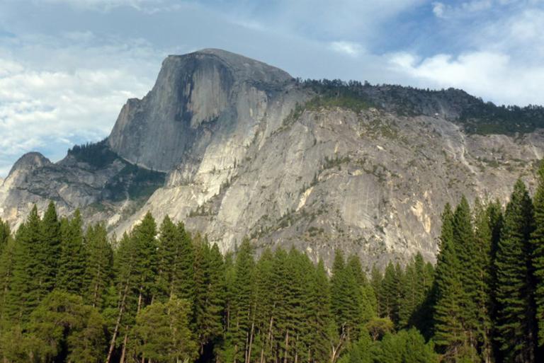 <p>Yosemite National Park features the Half Dome trail which stretches for about 16-miles. It's actually a granite dome rock formation that rises more than 4,737 feet. One of its sides is sheer, while the other three are smooth and round. Geologists have been writing about the dome since the 1800s where it was described as "perfectly inaccessible." </p> <p>Throughout the hike, there are incredible views of Vernal and Nevada Falls. Only experienced hikers should do this one alone because there's a large portion that requires climbing up 400-feet using two metal cables.</p>