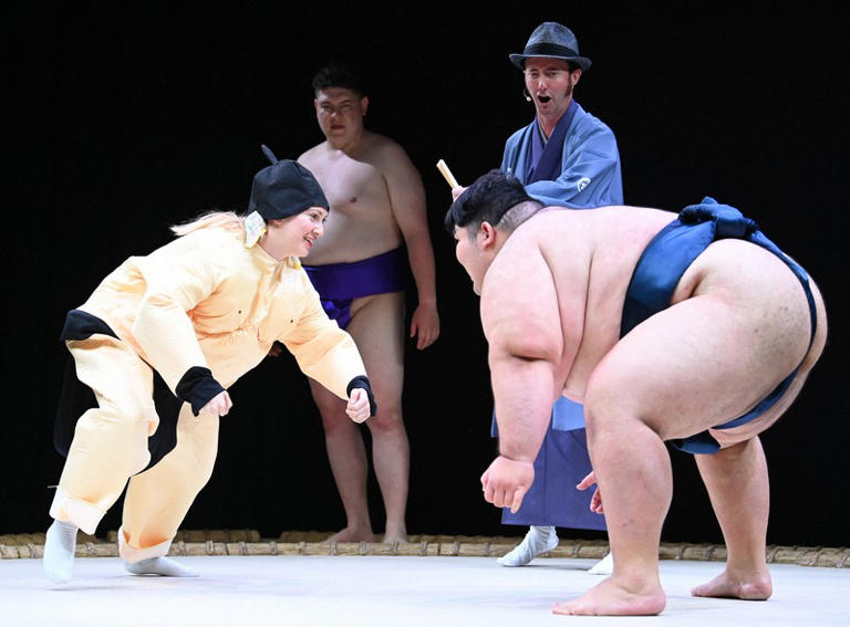 A spectator becomes a "rikishi" sumo wrestler during a performance at the "The Sumo Hall Hirakuza Osaka," in Osaka's Naniwa Ward on May 28, 2024. (Mainichi/Takehiko Onishi)