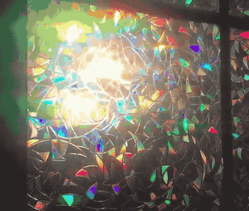 Gif of light shining through the film causing rainbow patterns