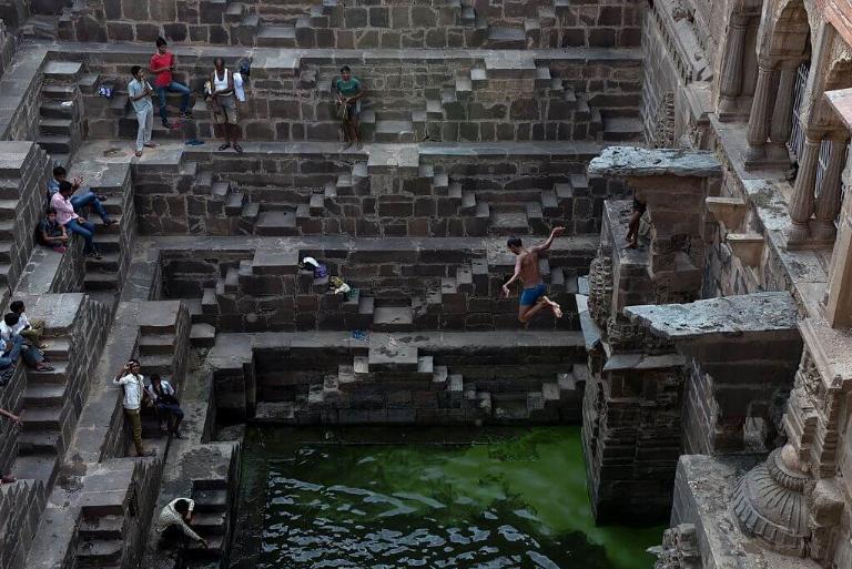<p>The Chand Baori Well found in India is an excellent example of how great architecture was even in the past. This well came about during the 9th century and was a reliable water solution that lasted throughout the year.</p> <p>The now-famous well is more than 98 feet deep, has 13 floors and 3,500 steps. The most exciting part about it is that there are no handrails and a 100-foot plunge to the water. We imagine Michael Phelps and any other water lovers would appreciate diving into it. </p>