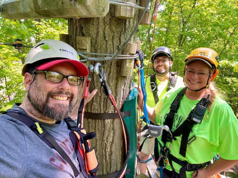 Cleveland.com's Peter Chakerian, left, with guides Alexis Tenacious Taco Solorzano and Donna Da Boss Spitler of Lake Erie Canopy Tours.