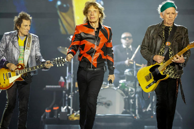 Ronnie Wood, Mick Jagger, and Keith Richards of the Rolling Stones perform at Gillette Stadium.