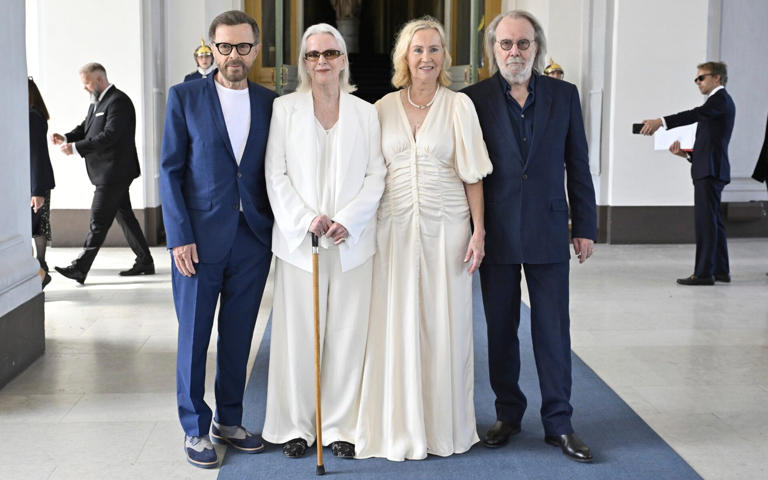 The four members of ABBA arrive at Stockholm Royal Palace to receive their honours