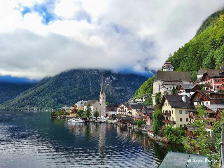 The adorable storybook small town of Hallstatt Austria is nestled in the majestic Austrian Alps. The UNESCO World Herita