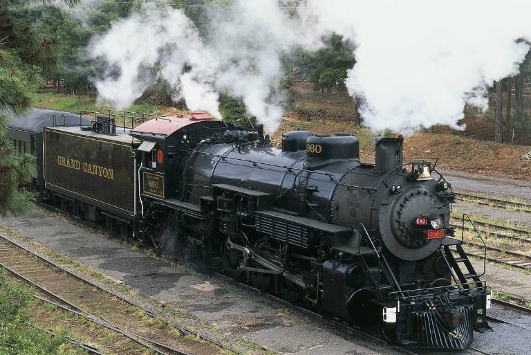 <p>If you want a scenic journey through one of the seven wonders of the world, hop on the <i>Grand Canyon Railway</i>. The train passes centuries-old rail cars that have been restored to reflect the Wild West. The railway partners with the Grand Canyon Hotel, where visitors can stay after the ride.</p> <p>Since 1901, the <i>Grand Canyon Railway</i> has taken tourists through the deserts, pines, and prairies around the Grand Canyon. You can reserve your car and food ahead of time and enjoy musicians along the ride.</p>