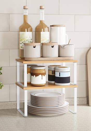 the white organizers stacked on a counter