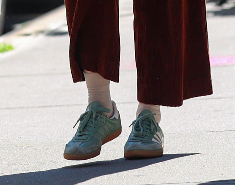 Dakota Johnson Channels It Girl Energy in Teal Adidas Sambas on Set for Materialist in New York