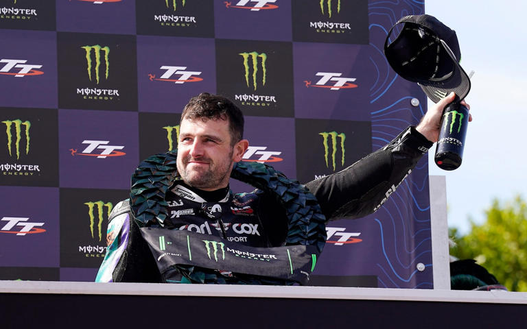 Michael Dunlop celebrates winning the Monster Energy Supersport Race
