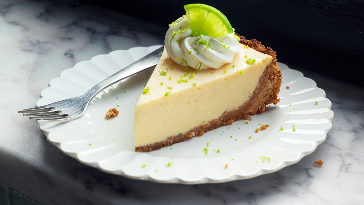 <p>The tangy sweetness of Key lime pie is a slice of paradise that non-Americans happily indulge in. The creamy, citrus-infused filling nestled in a buttery graham cracker crust is a flavor sensation that transports taste buds to the sunny shores of Florida. Whether enjoyed after a seafood feast or as a refreshing treat on a hot day, Key lime pie is a dessert classic loved worldwide.</p>