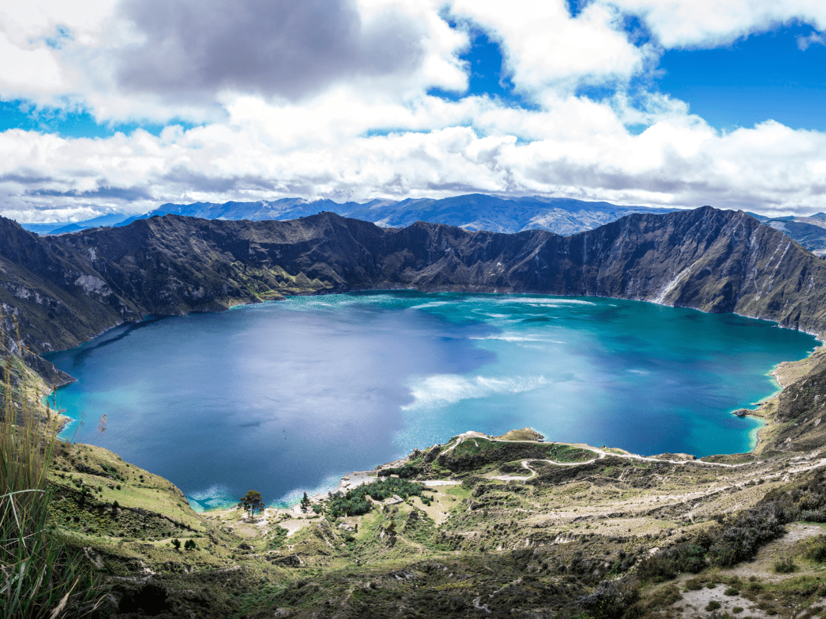 <p>Located in the remote heights of Ecuador’s Andes Mountains, Quilotoa is an ancient volcano that might look slightly different from other volcanoes you’ve seen. Centuries ago, during a massive eruption, its cone collapsed inward, leaving an intensely blue-green lake behind. This is one of the most stunning natural places and most beloved destinations in Ecuador for travelers, and the start of an epic 4-day trek that takes hikers past some of the most dramatic landscapes in the Andes.</p>