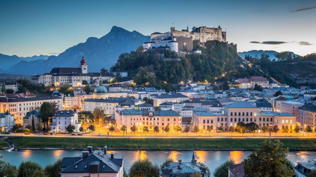 <p>In Western Austria, Salzburg is a picturesque escape on the foot of the Alps. It is renowned for its baroque architecture, beautiful gardens, and musical traditions. In addition to being the birthplace of Mozart, it is also home to rolling hills and magical landscapes that attract visitors worldwide.</p>