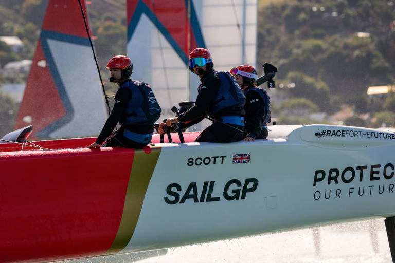 Team Great Britain helmed by Giles Scott race during SailGP in New Zealand.