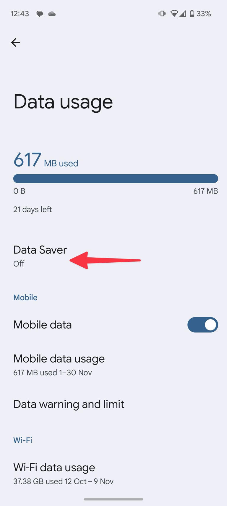 red solid arrow pointing to data saver off on data saver page in Android settings