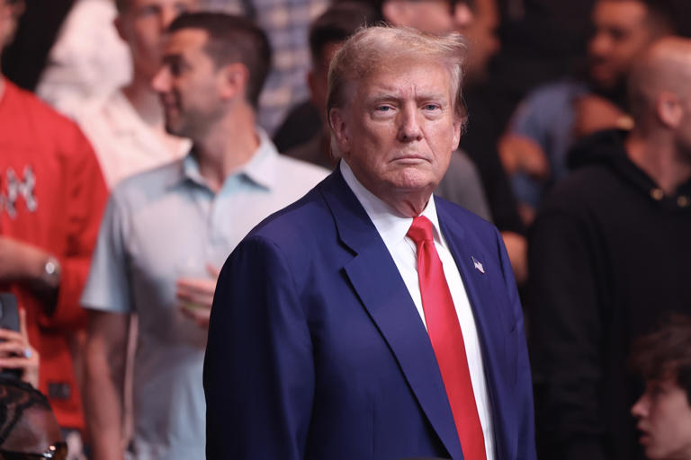 Former President Donald Trump attends UFC 302 at Prudential Center on Saturday in Newark, New Jersey. A new report found that those close to the former president received financial benefits after testifying in Trump's criminal cases.