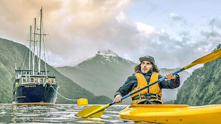 Contiki's Real New Zealand itinerary includes a kayak tour of Doubtful Sound during an overnight cruise.