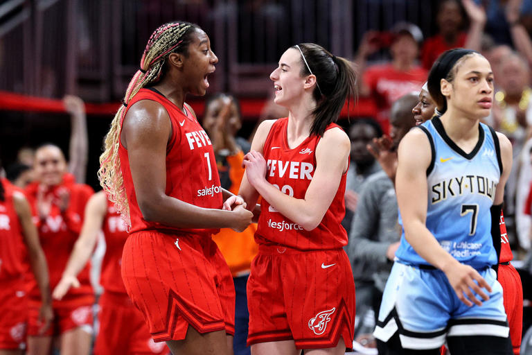 Aliyah Boston and Caitlin Clark of the Indiana Fever celebrate after defeating the Chicago Sky in the game at Gainbridge Fieldhouse on June 1, 2024, in Indianapolis.