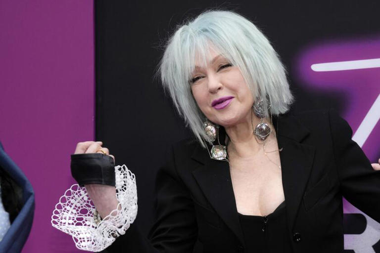Cyndi Lauper, who stars in the new documentary "Let the Canary Sing," will embark on a 23-date farewell tour in October. ((Charles Sykes / Invision / Associated Press))
