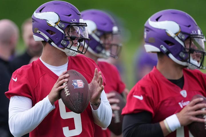 Vikings rookie J.J. McCarthy (9) throws with his fellow quarterbacks during organized team activities last week. At minicamp this week, he might get the chance to throw to Justin Jefferson for the first time.